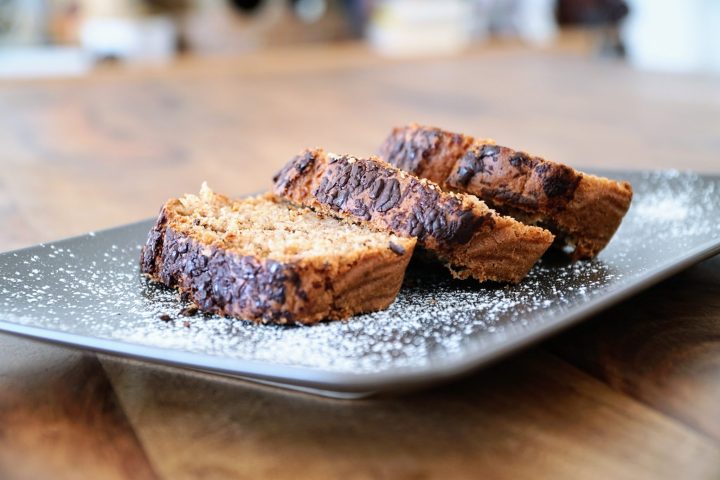 Slices of banana bread arranged on a metal tray